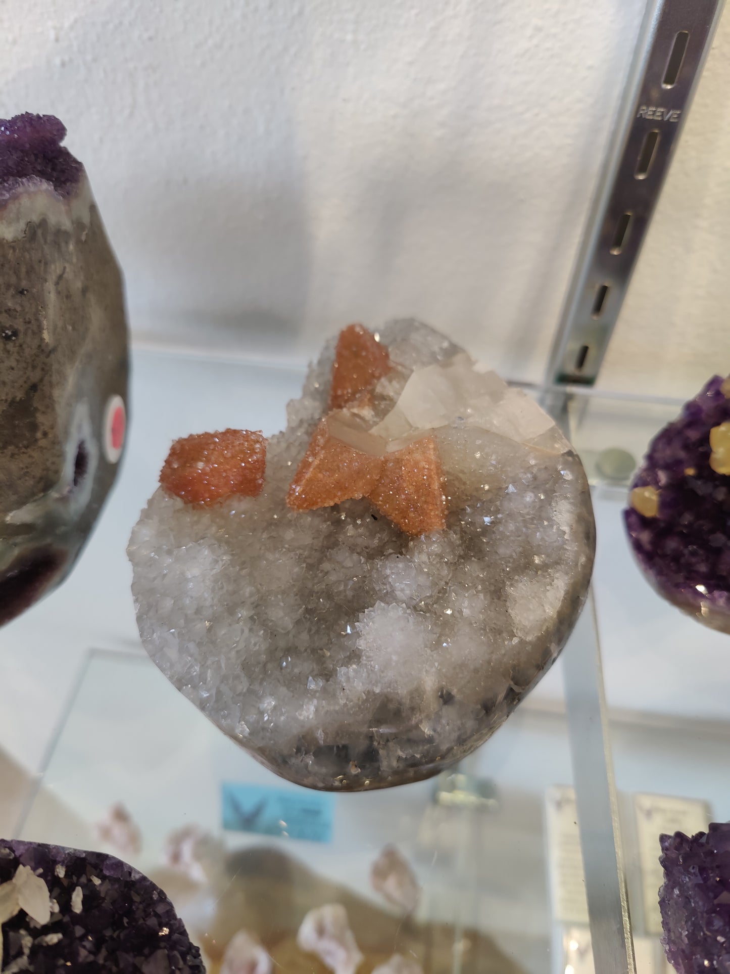 Clear Quartz with Quartz Coated Calcite Inclusions Geode Sculpture