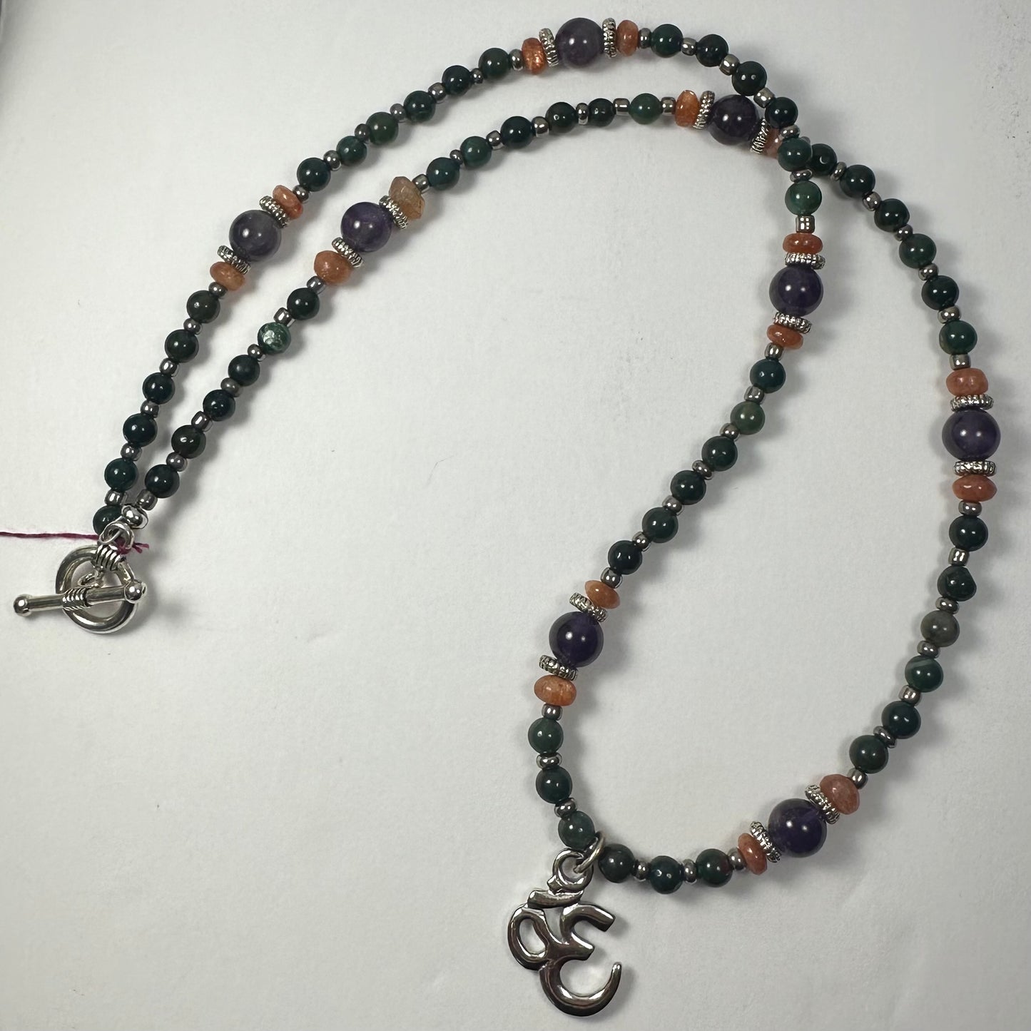 Handmade Bead Necklace with Silver 'Om' Pendant