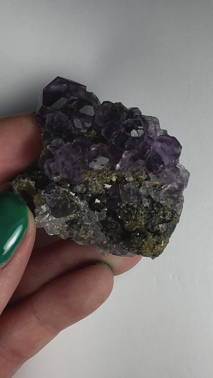 Purple Dodecahedral Fluorite with Calcite on matrix